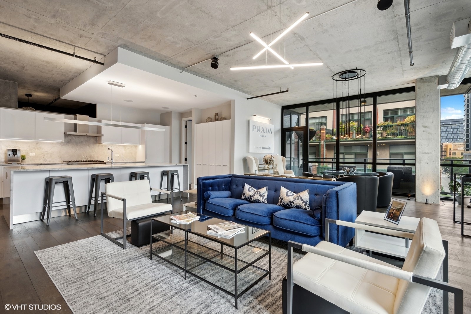 111 South Peoria Street, Unit 404 Chicago, IL 60607 - Photo 6 of 37 a living room with furniture a ceiling fan and a table