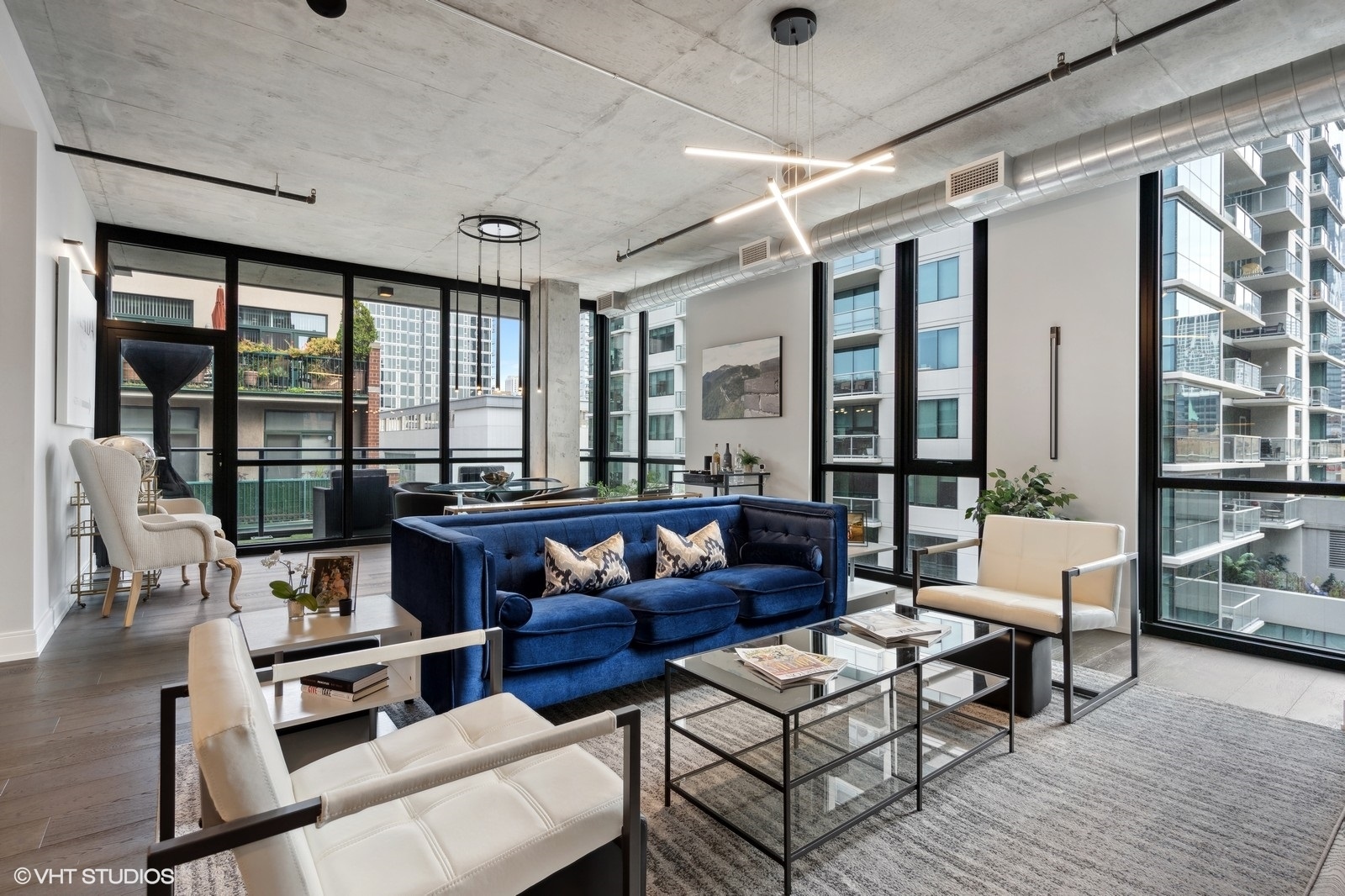 111 South Peoria Street, Unit 404 Chicago, IL 60607 - Photo 7 of 37 a living room with furniture and a large window
