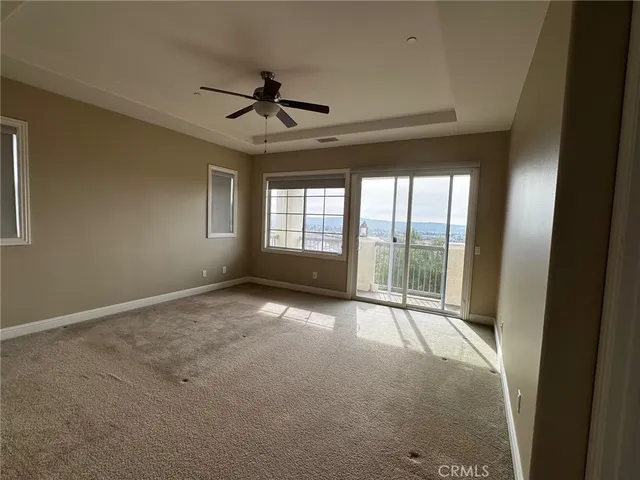 a spacious bathroom with a bathtub and a sink