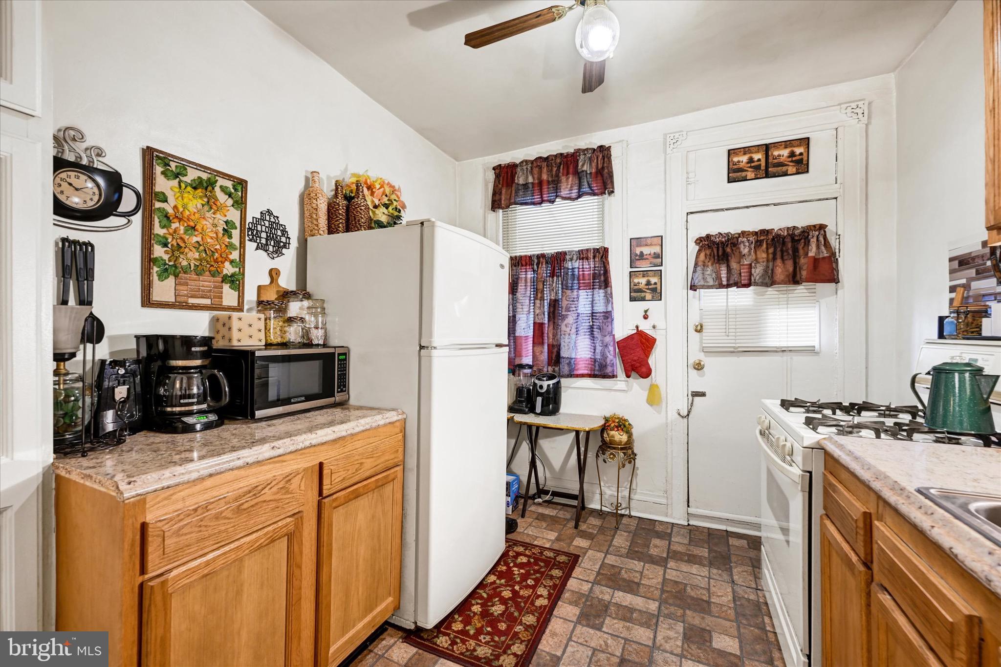 48 North Ellamont Street Baltimore, MD 21229 - Photo 11 of 26 a room with storage and utility