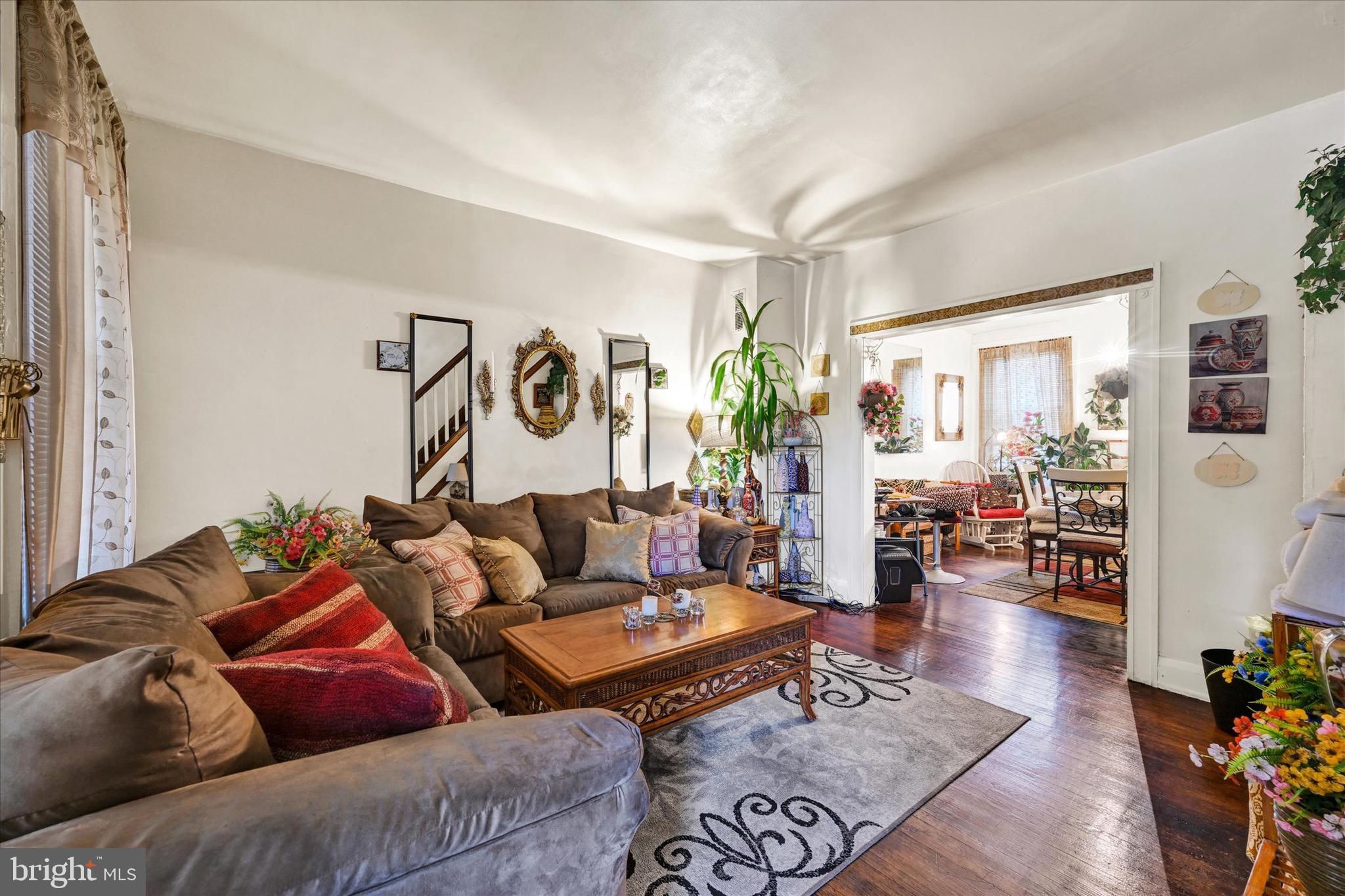48 North Ellamont Street Baltimore, MD 21229 - Photo 8 of 26 a living room with furniture and wooden floor