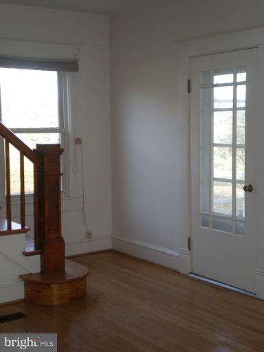 1520 Solomons Island Road Huntingtown, MD 20639 - Photo 14 of 30 Front entrance into the Living Room from Porch.