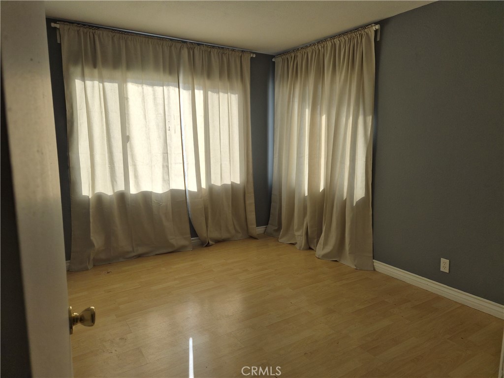 18749 Lemay Street Reseda, CA 91335 - Photo 6 of 17 an empty room with windows