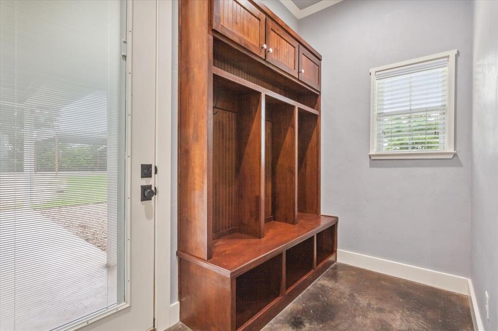 259 County Road 149 Riesel, TX 76682 - Photo 31 of 40 Mudroom featuring concrete flooring and baseboards