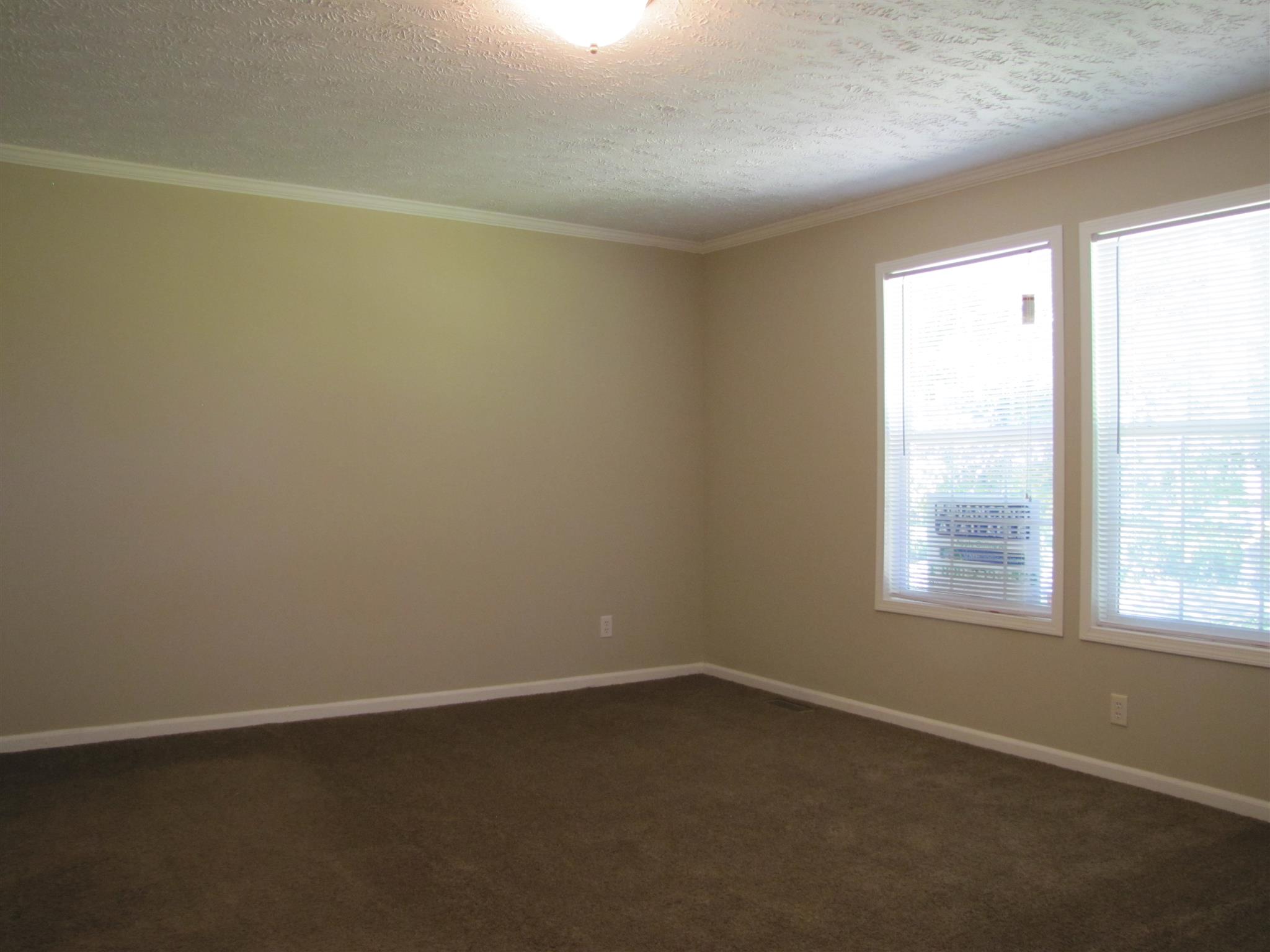 145 Womack Road Pelham, TN 37366 - Photo 8 of 19 an empty room with a window