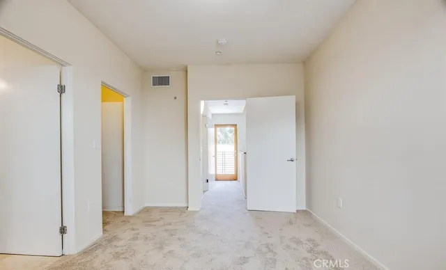 a bathroom with a shower and a toilet