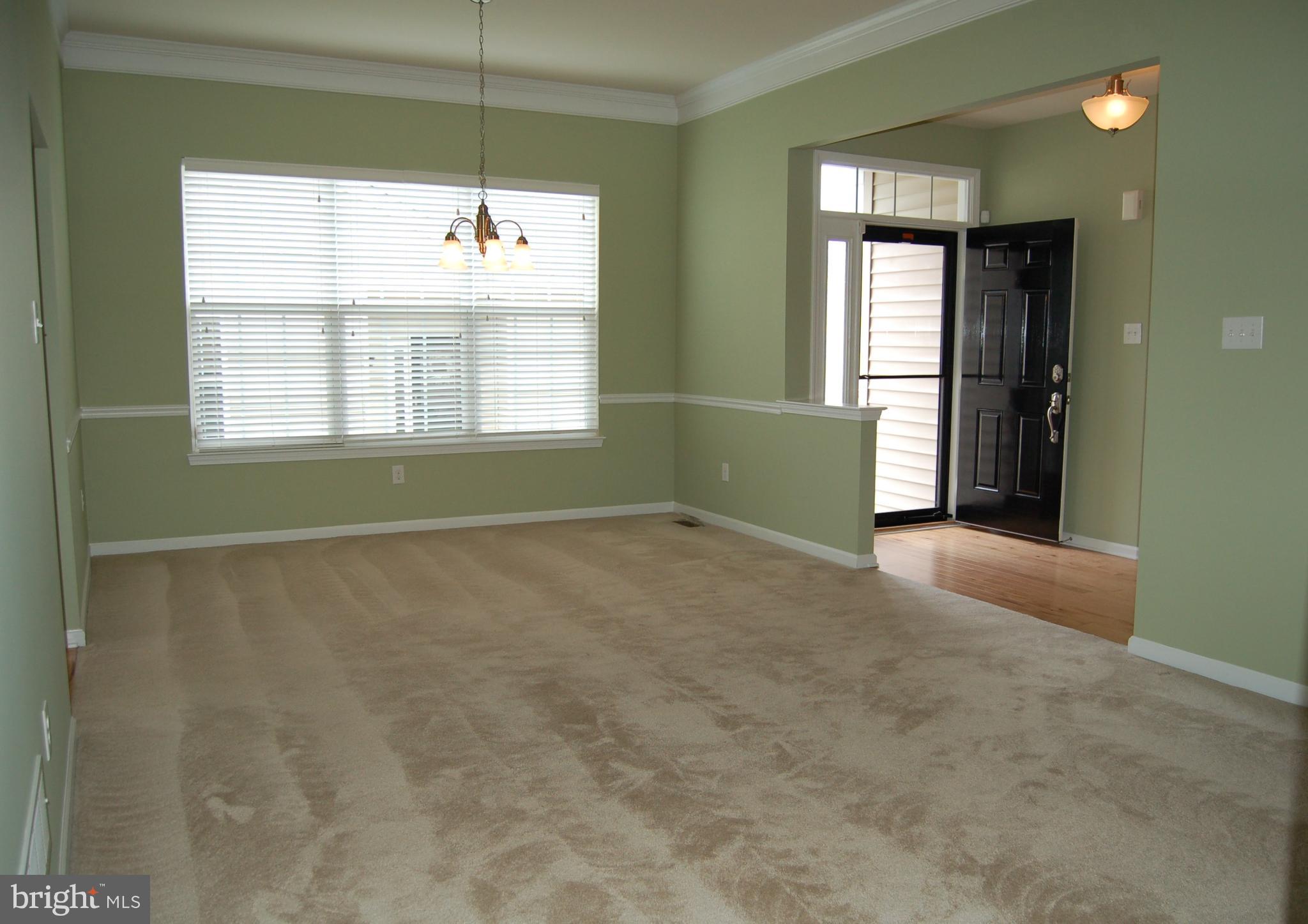 164 Davish Road Coatesville, PA 19320 - Photo 4 of 80 Liv/Din Rm with just cleaned & stretched carpeting