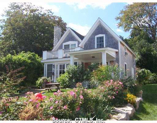 47 Front Street Groton, CT 06340 - Photo 1 of 1 a front view of a house with a yard