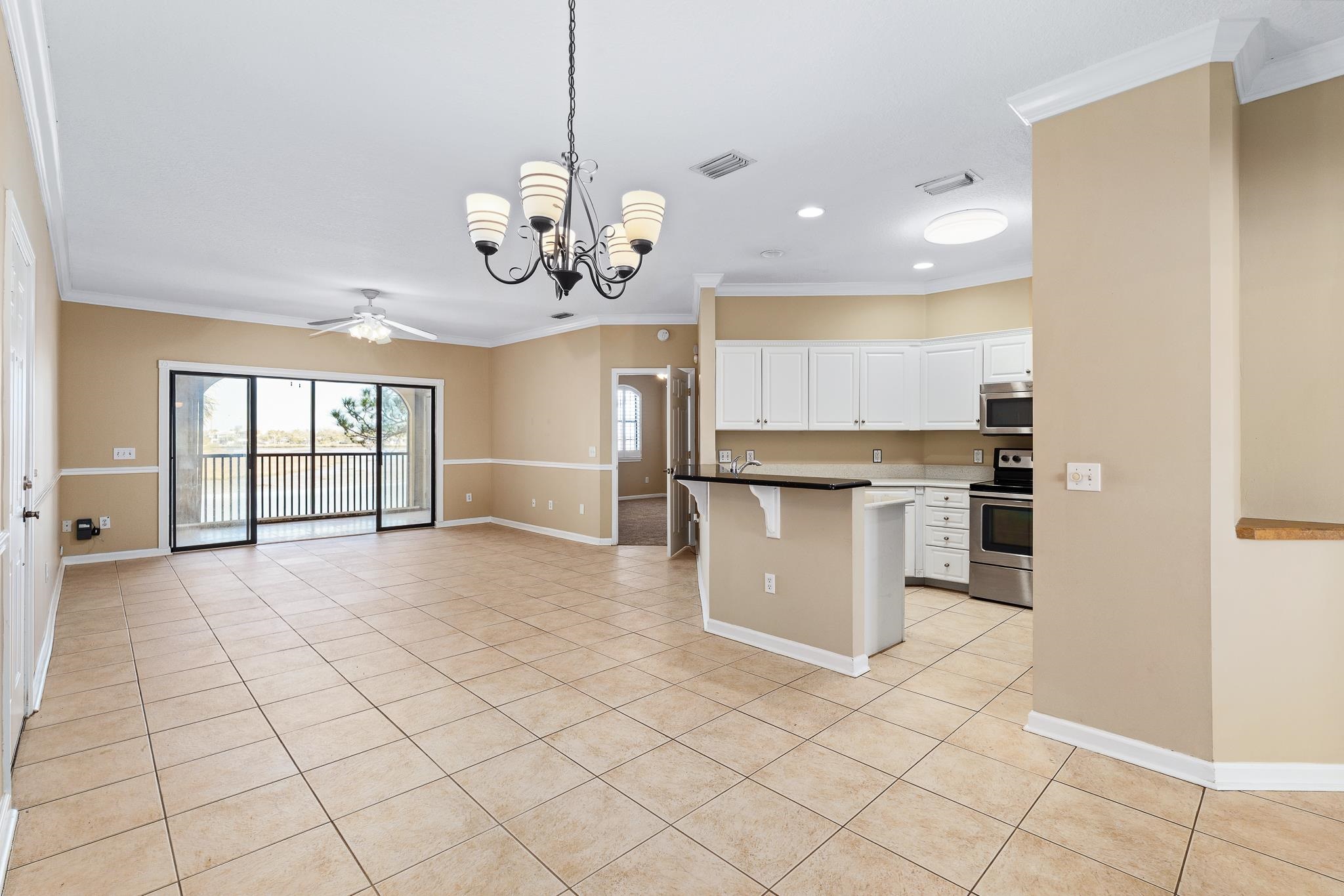 3425 Haley Pointe Road St. Augustine, FL 32084 - Photo 13 of 71 a view of a kitchen with furniture and stainless steel appliances