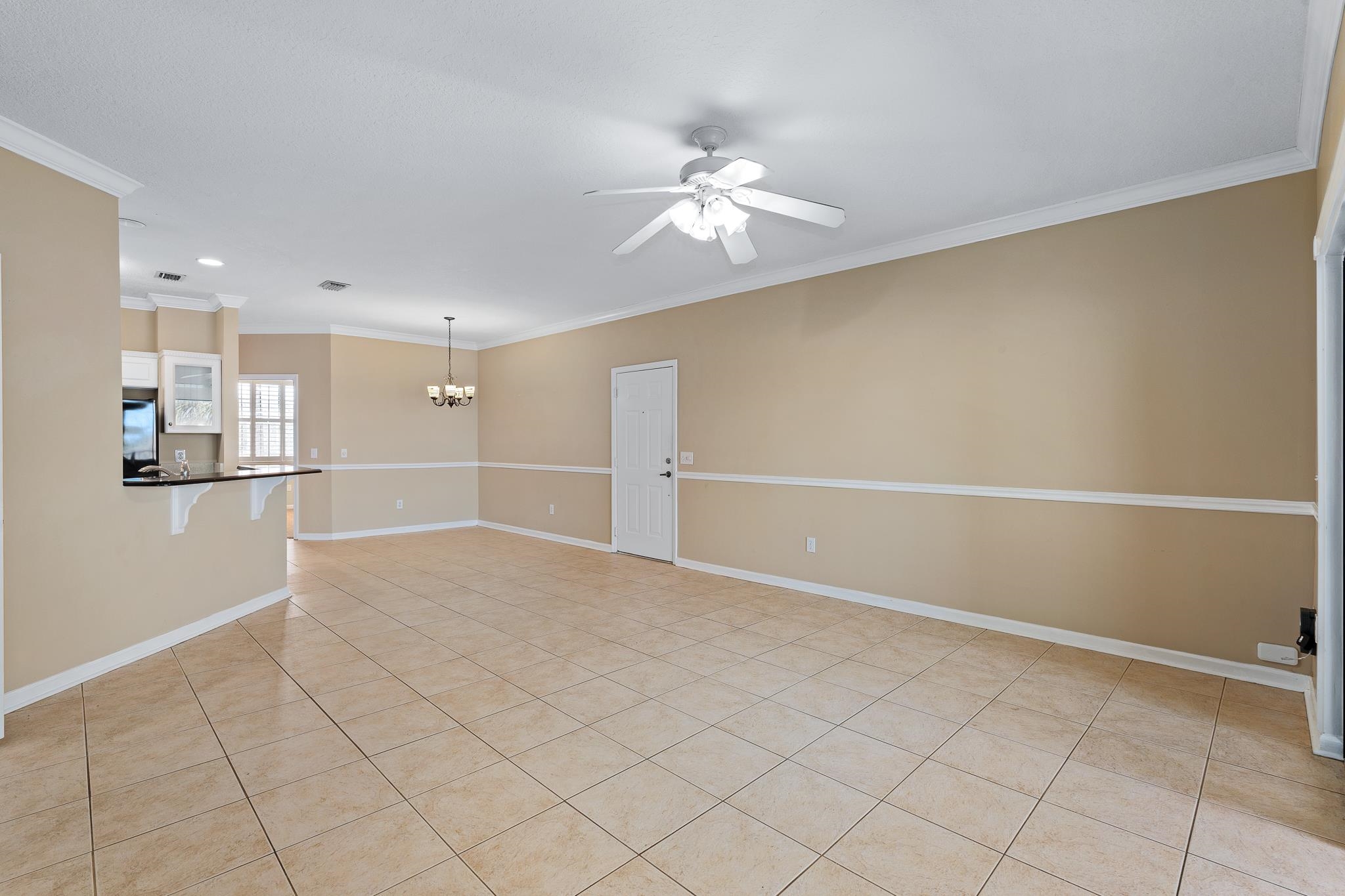 3425 Haley Pointe Road St. Augustine, FL 32084 - Photo 17 of 71 a view of a kitchen with wooden floor and a window