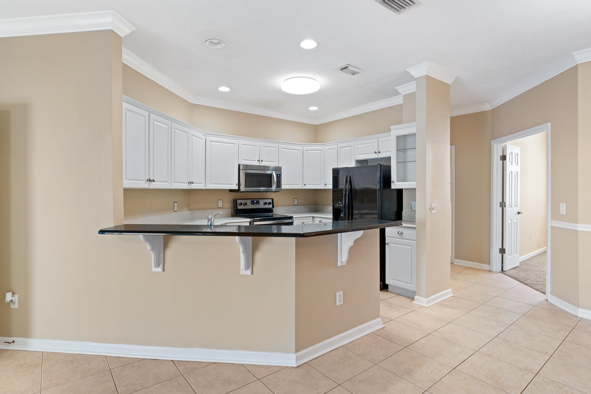 3425 Haley Pointe Road St. Augustine, FL 32084 - Photo 18 of 71 a large kitchen with stainless steel appliances lots of counter top space