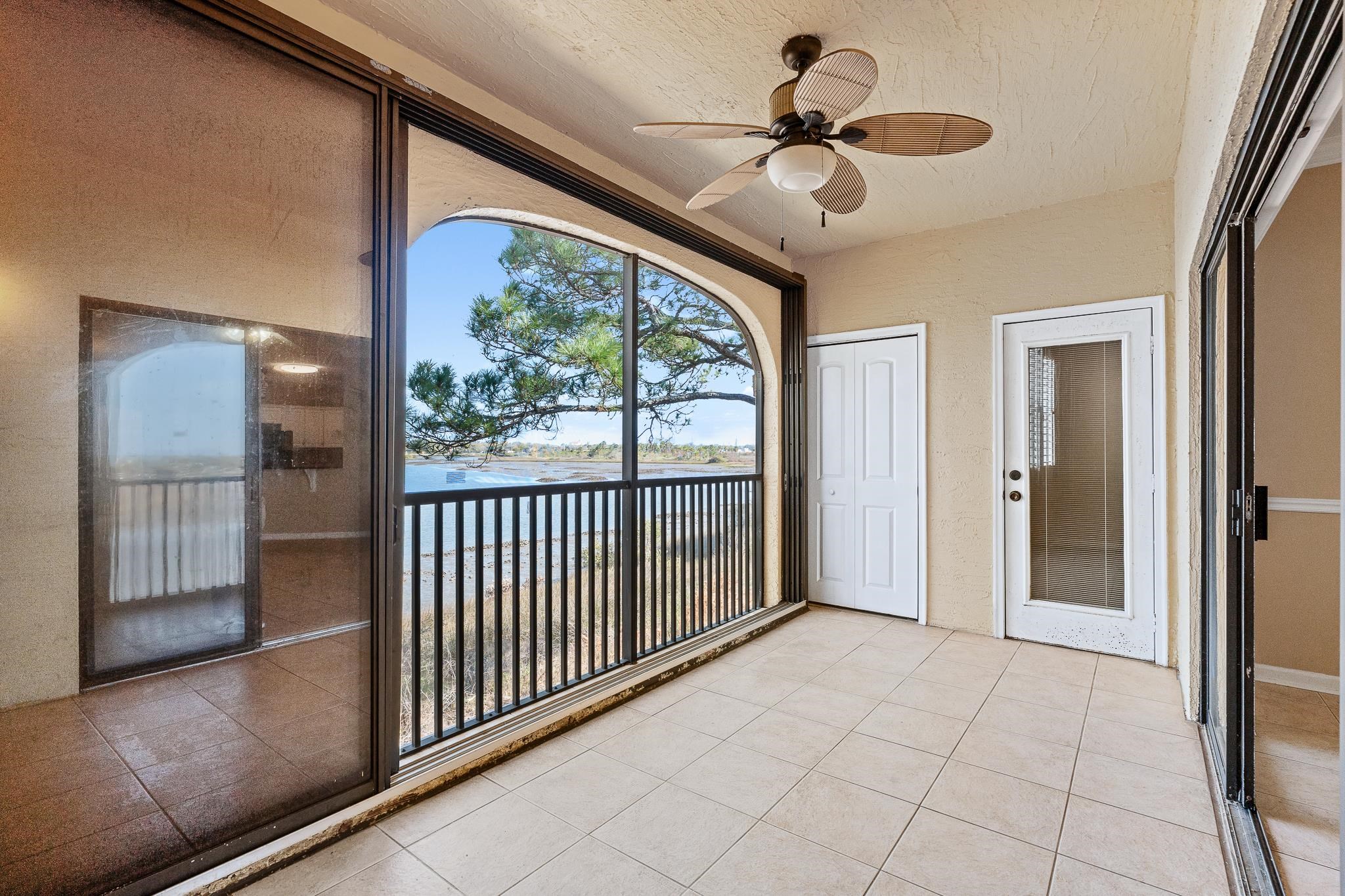 3425 Haley Pointe Road St. Augustine, FL 32084 - Photo 2 of 71 a view of a room with a large window and chandelier fan