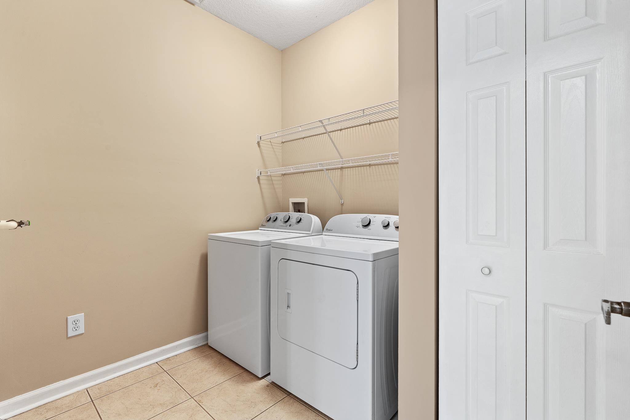 3425 Haley Pointe Road St. Augustine, FL 32084 - Photo 22 of 71 a utility room with dryer and washer