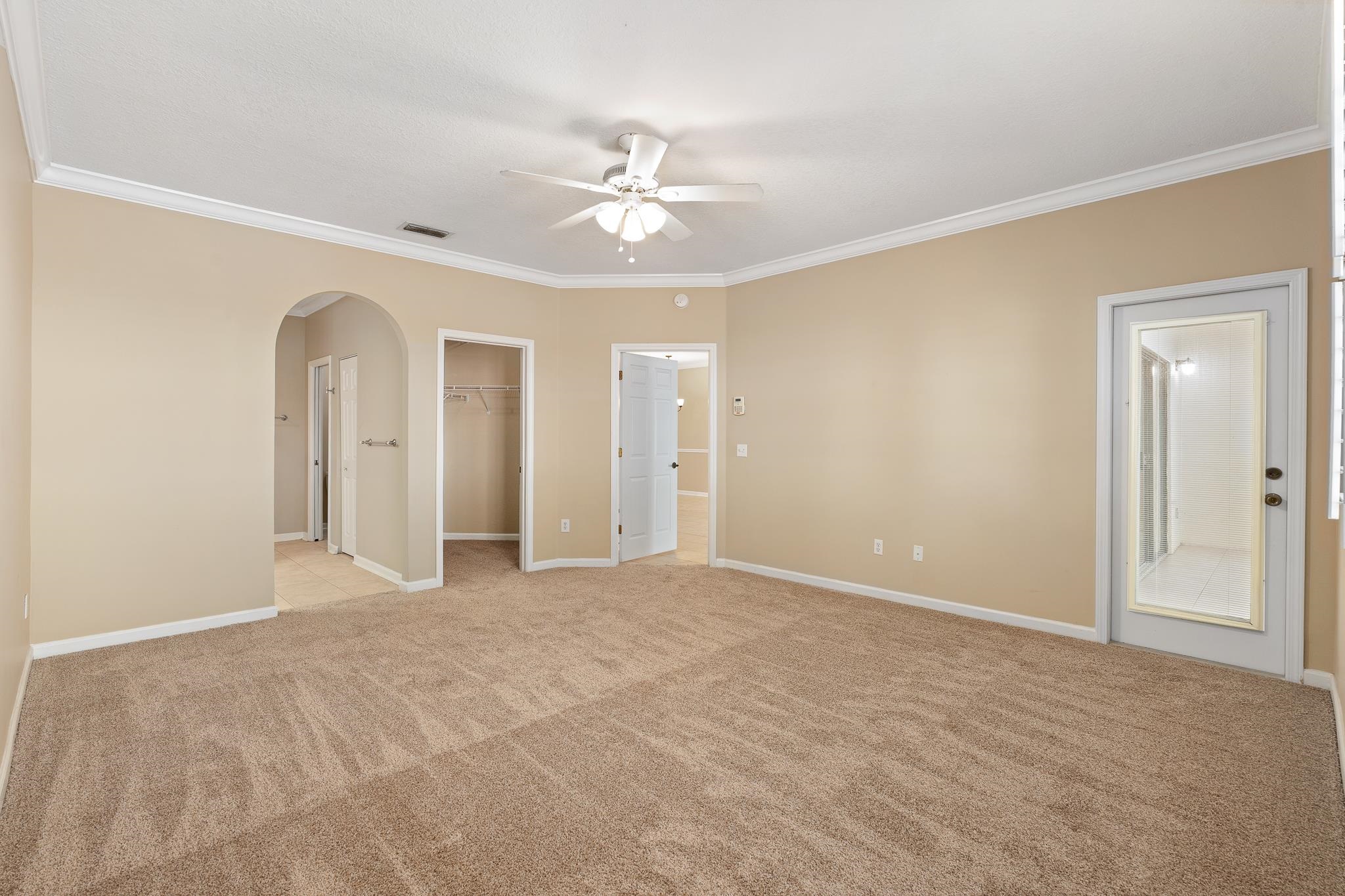 3425 Haley Pointe Road St. Augustine, FL 32084 - Photo 28 of 71 a view of an empty room with a ceiling fan