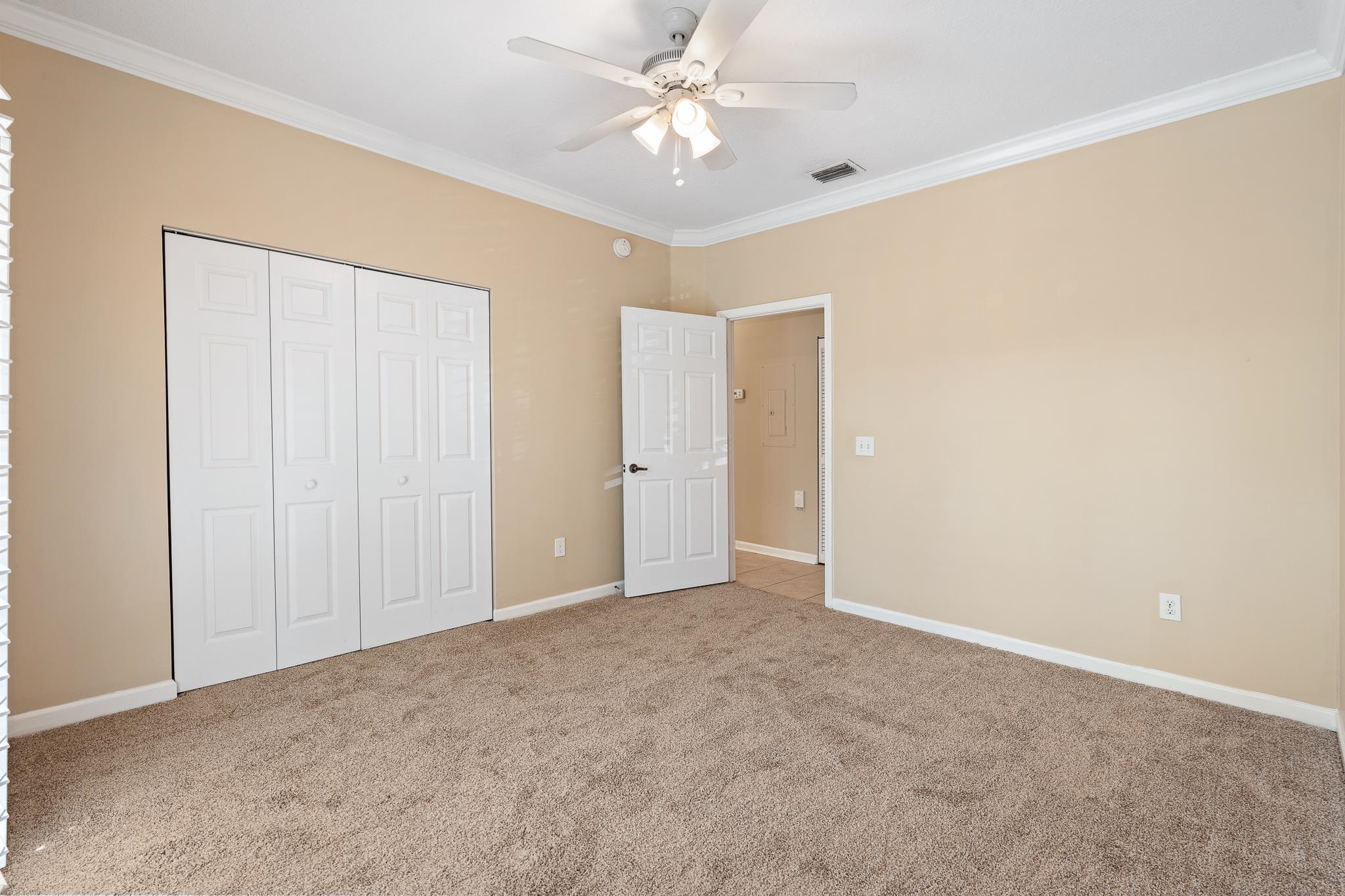 3425 Haley Pointe Road St. Augustine, FL 32084 - Photo 3 of 71 an empty room with closet and a ceiling fan