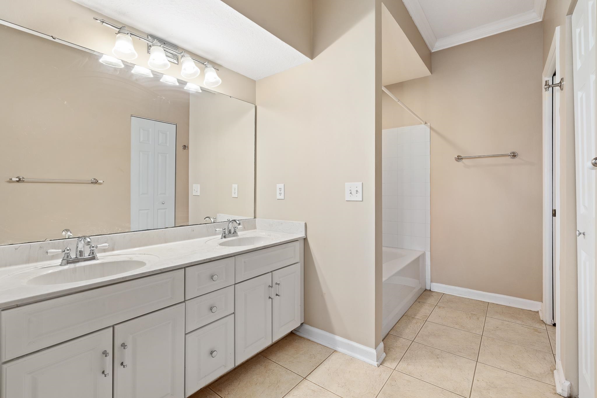 3425 Haley Pointe Road St. Augustine, FL 32084 - Photo 31 of 71 a bathroom with a granite countertop sink a mirror and a