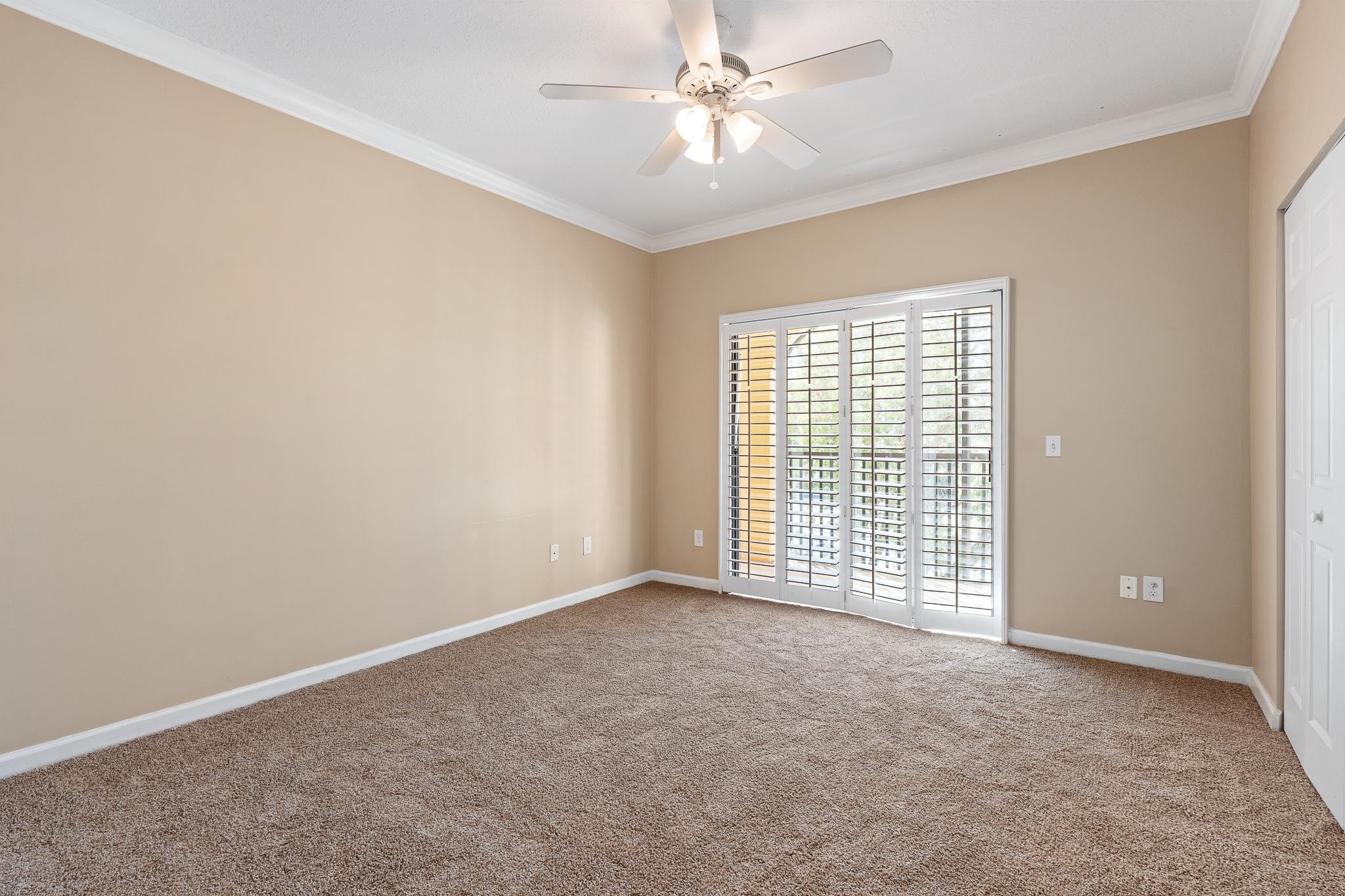3425 Haley Pointe Road St. Augustine, FL 32084 - Photo 4 of 71 an empty room with windows and fan
