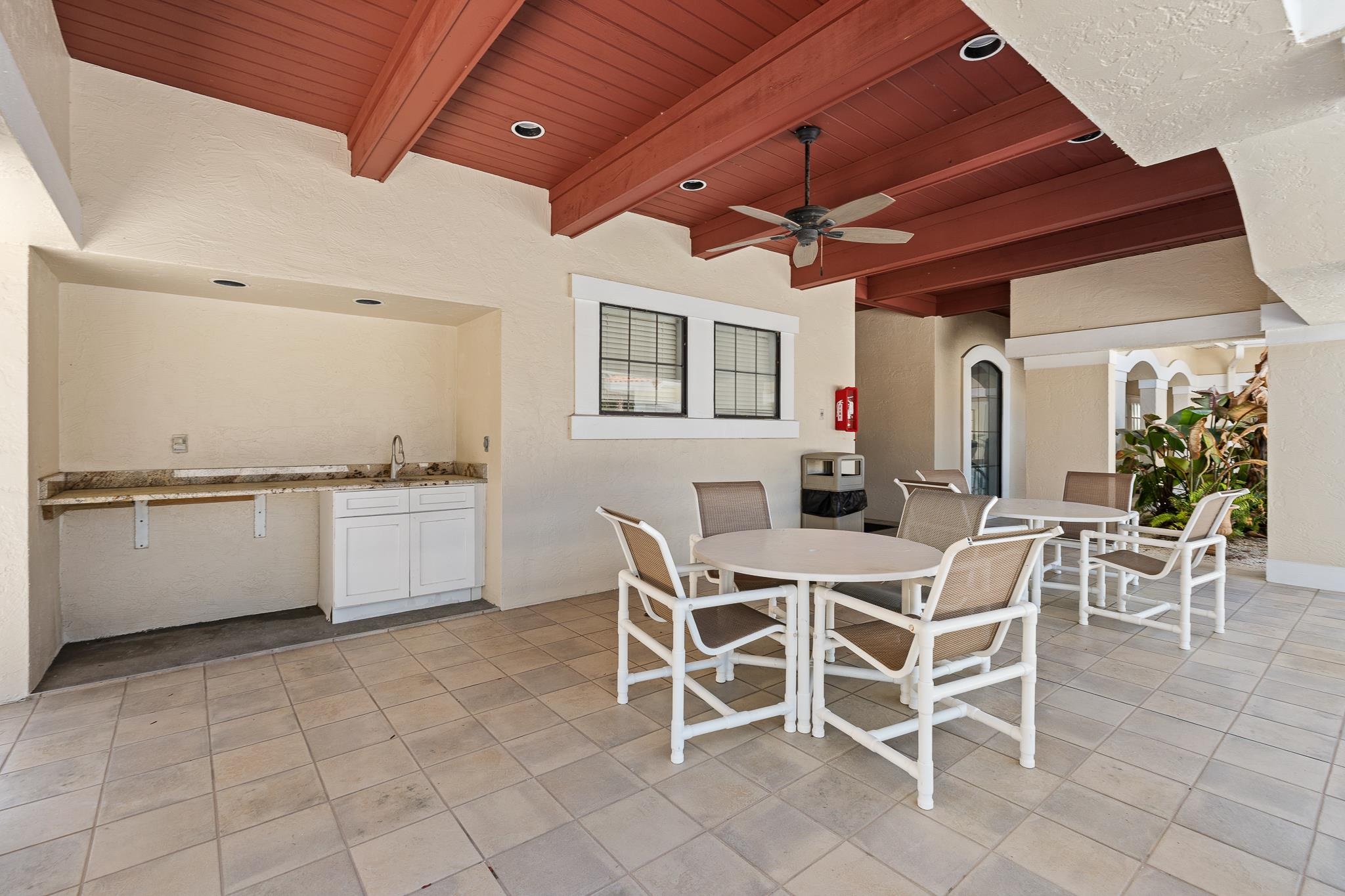 3425 Haley Pointe Road St. Augustine, FL 32084 - Photo 58 of 71 a view of a kitchen with a dining table and chairs