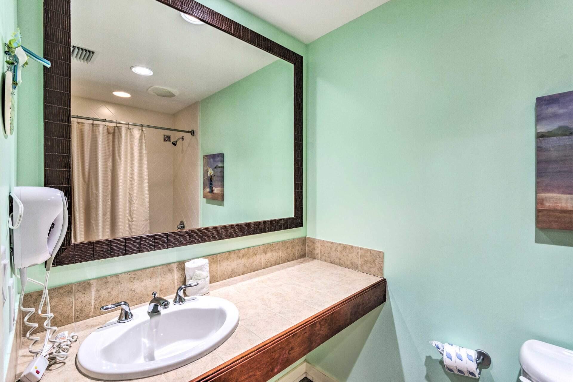 5000 South Sandestin Boulevard, Unit 6512 Miramar Beach, FL 32550 - Photo 13 of 29 a bathroom with a sink and a mirror