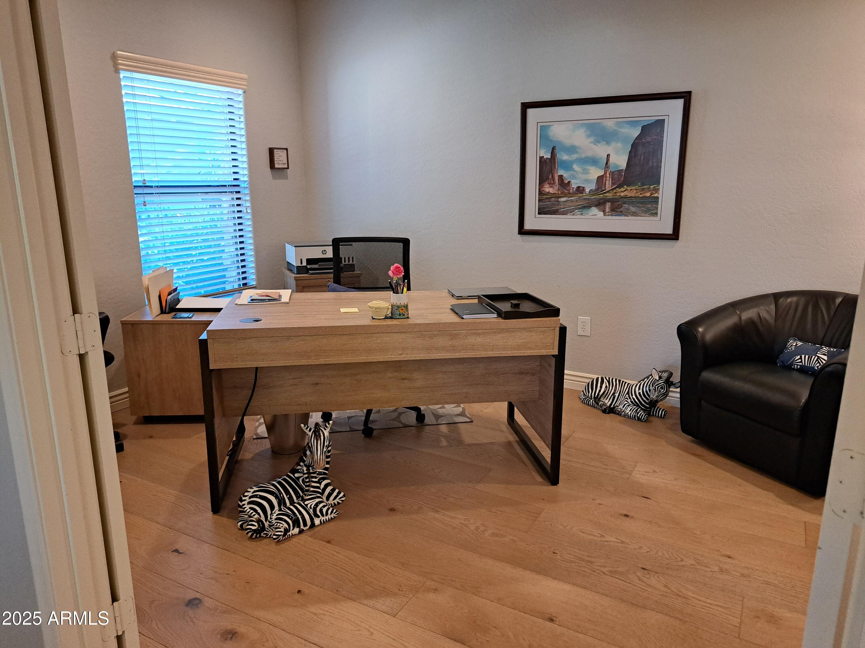 21320 North 56th Street, Unit 1163 Phoenix, AZ 85054 - Photo 23 of 48 a view of a livingroom with furniture and window
