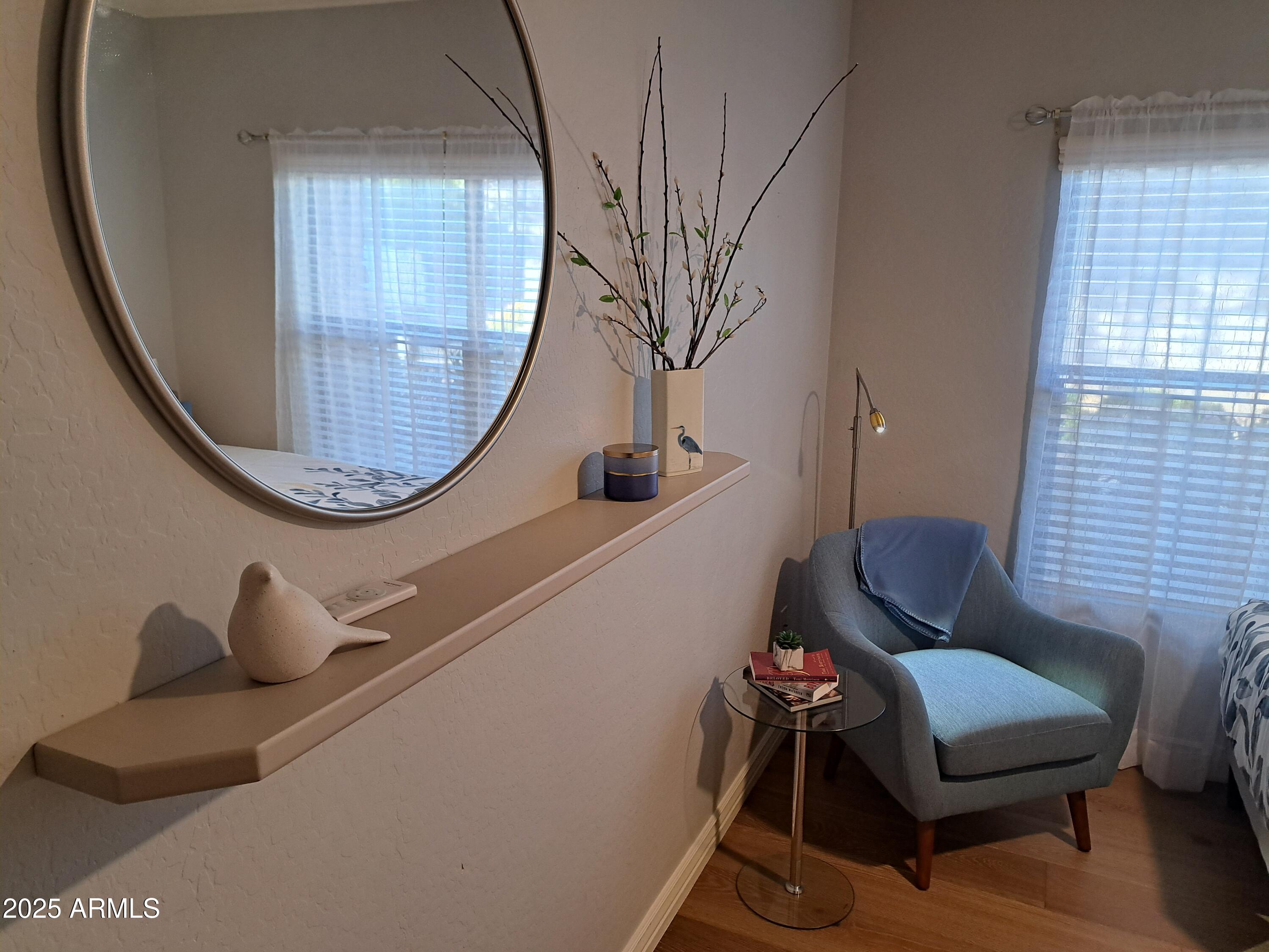 21320 North 56th Street, Unit 1163 Phoenix, AZ 85054 - Photo 32 of 48 a bathroom with a toilet mirror and sink