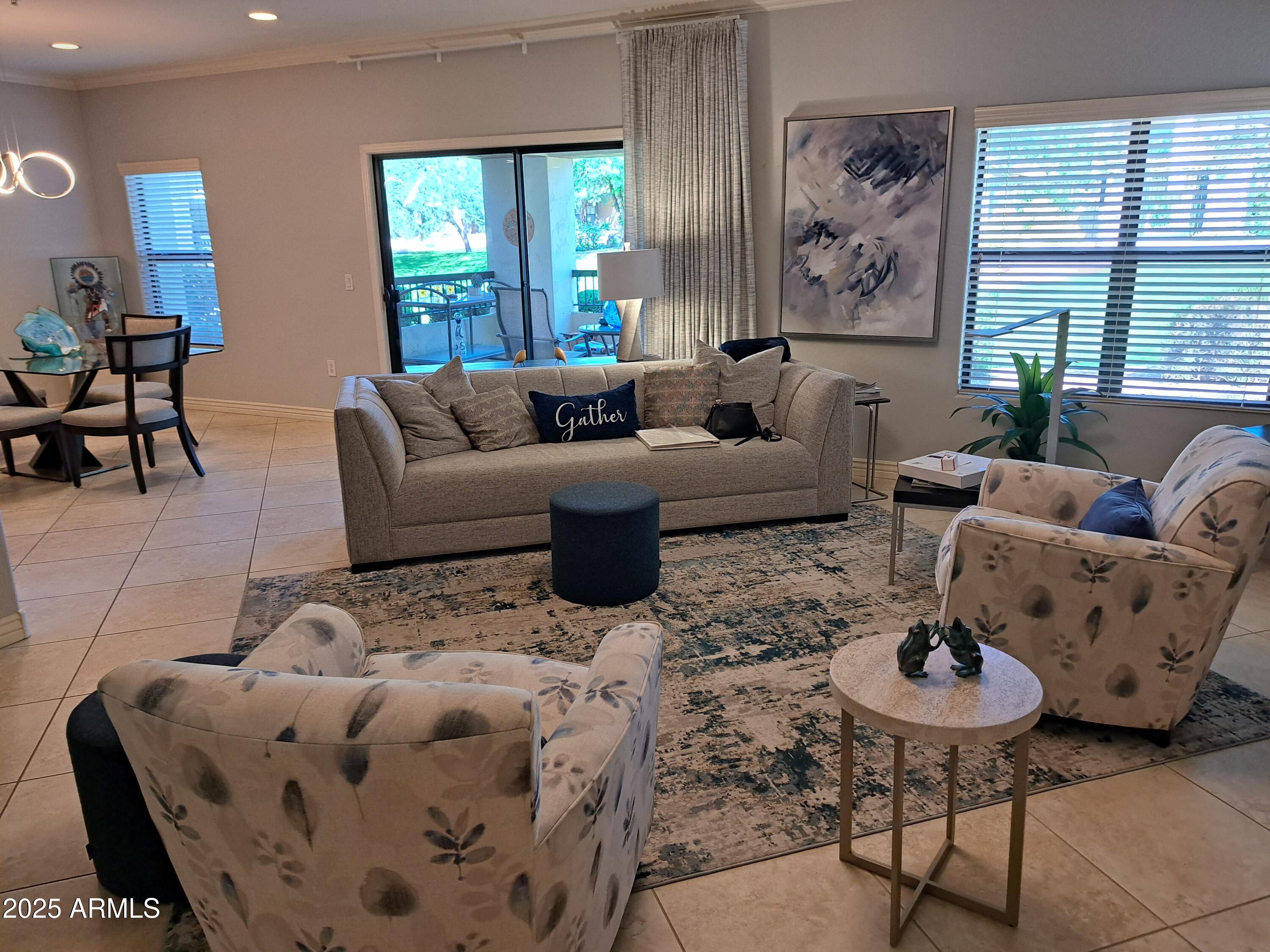 21320 North 56th Street, Unit 1163 Phoenix, AZ 85054 - Photo 5 of 48 a living room with furniture and a large window
