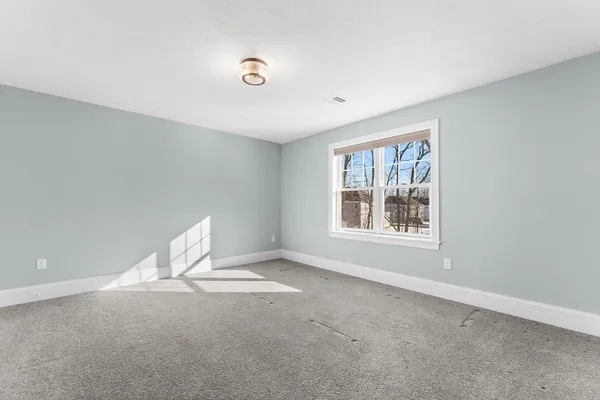 a view of a livingroom with a window