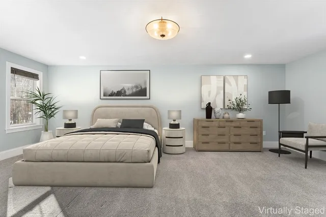 a bedroom with furniture and a bed