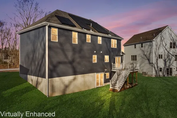 a view of a back yard of the house