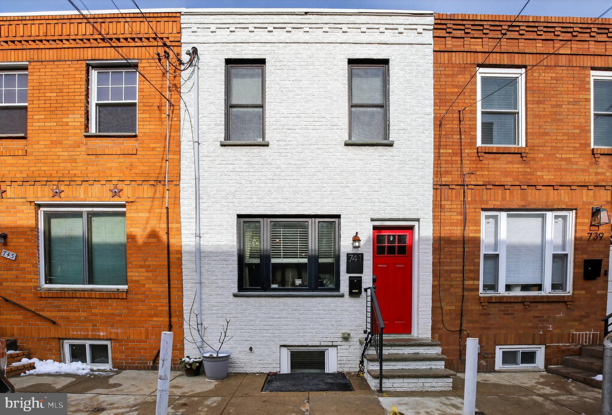 741 Watkins Street Philadelphia, PA 19148 - Photo 25 of 25 a front view of a house with a large windows