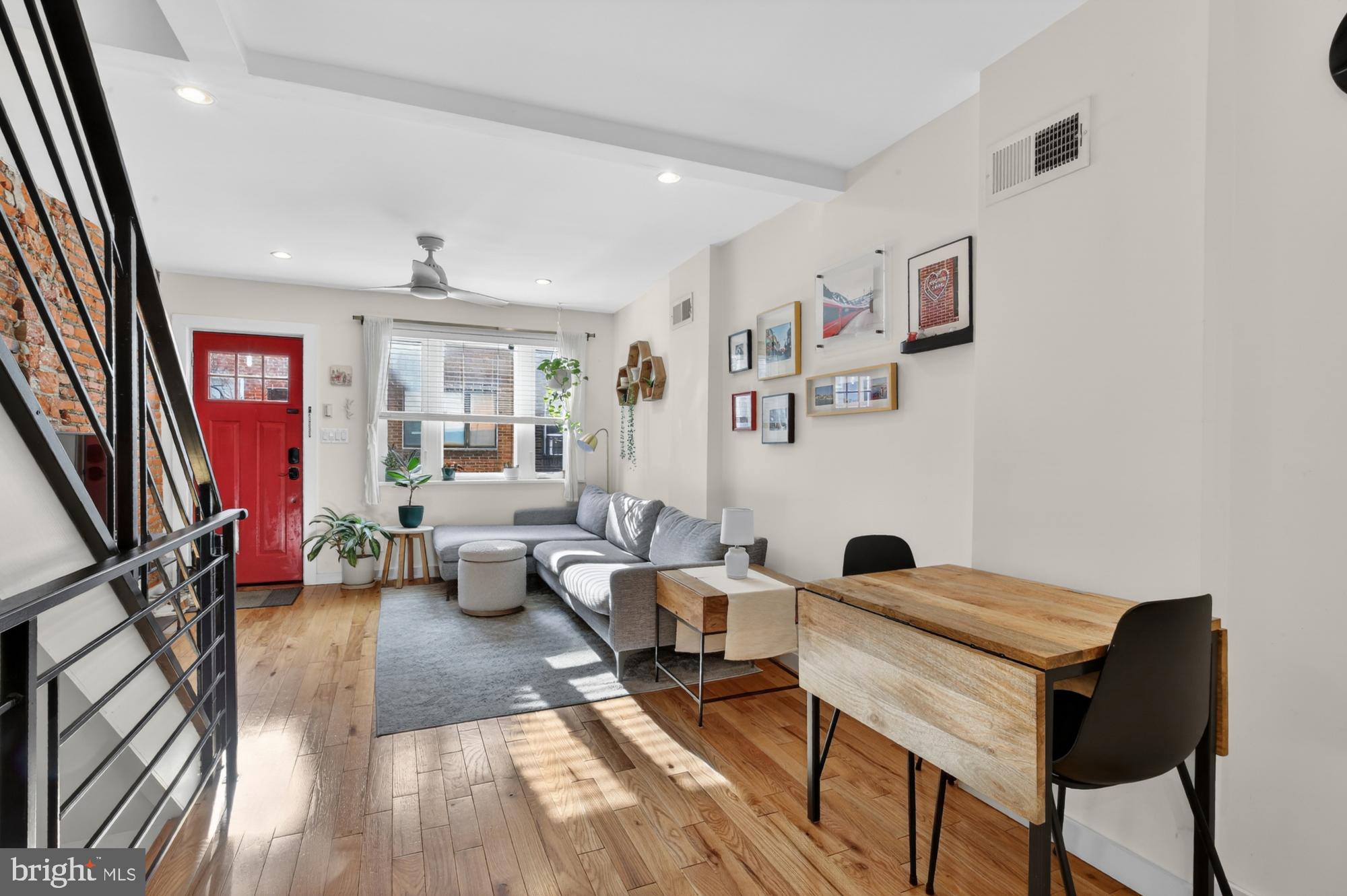 741 Watkins Street Philadelphia, PA 19148 - Photo 5 of 25 a living room with furniture and a flat screen tv
