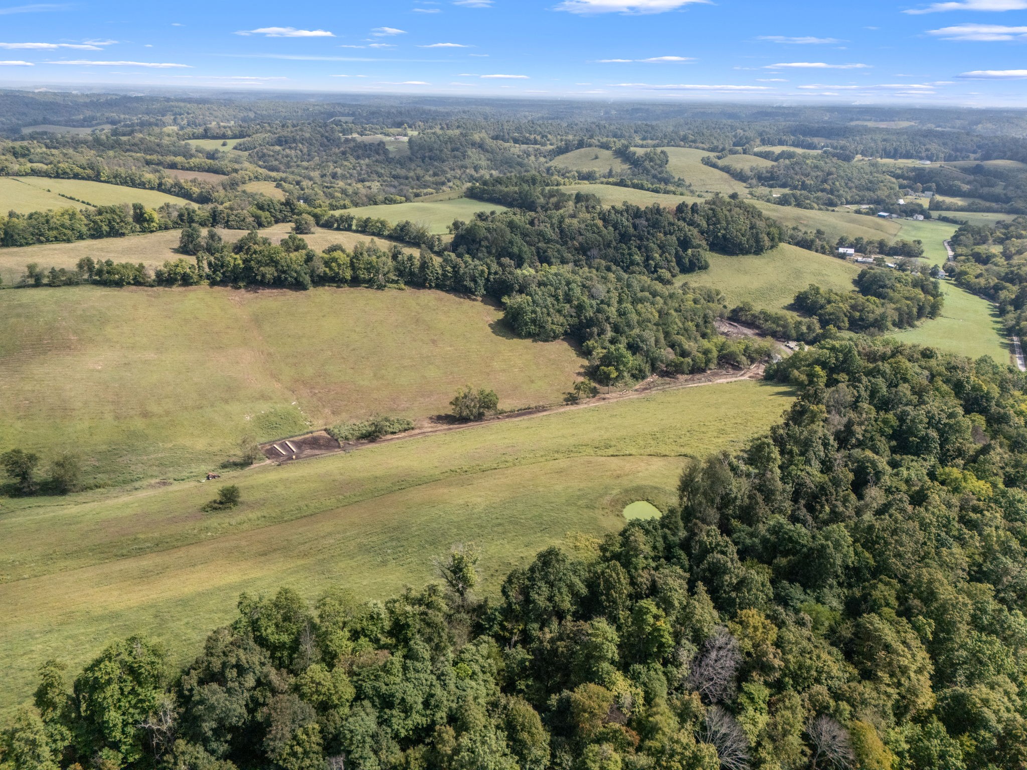 692 Anderson Road Shelbyville, TN 37160 - Photo 25 of 49 an aerial view of ocean and residential houses with outdoor space