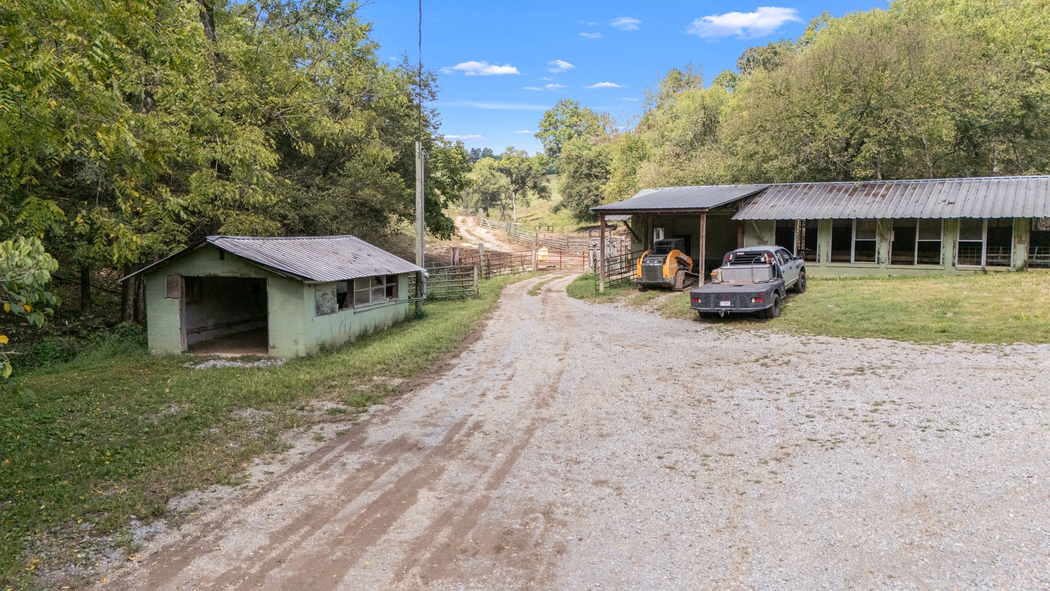 692 Anderson Road Shelbyville, TN 37160 - Photo 42 of 49 a view of a big house with a yard and sitting area