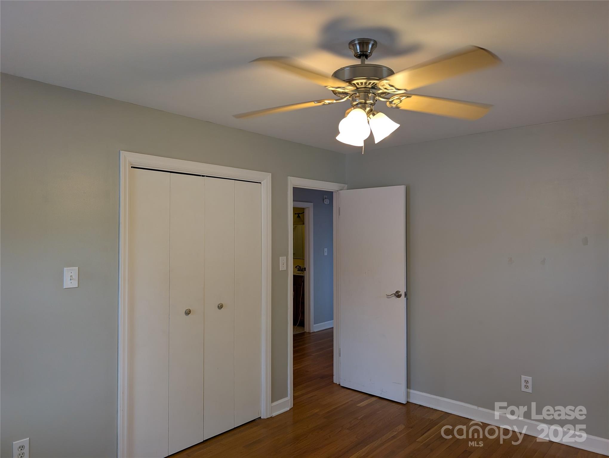 155 Hamptons Cove Road Troutman, NC 28166 - Photo 14 of 22 a view of a chandelier fan and a closet