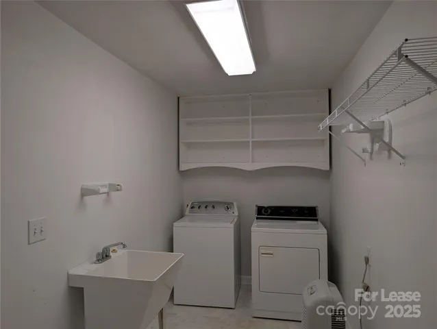 a bathroom with a shower and a sink