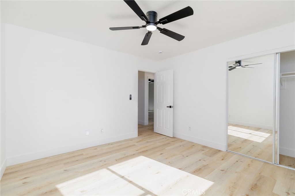 51621 Riza Avenue Cabazon, CA 92230 - Photo 24 of 32 wooden floor in an empty room
