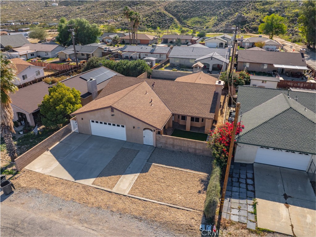 51621 Riza Avenue Cabazon, CA 92230 - Photo 5 of 32 an aerial view of a house with a yard