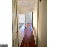 209 Sumac Street Philadelphia, PA 19128 - Photo 5 of 10 a view of a hallway with wooden floor
