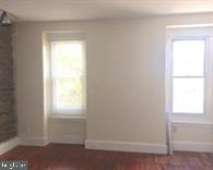 209 Sumac Street Philadelphia, PA 19128 - Photo 9 of 10 a view of an empty room and a window