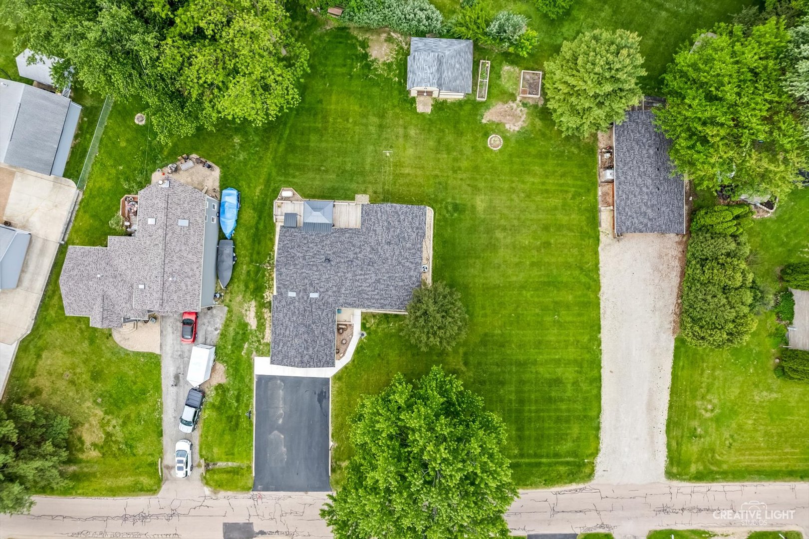 1483 Nova Road Sandwich, IL 60548 - Photo 24 of 29 an aerial view of a house with a yard basket ball court and outdoor seating