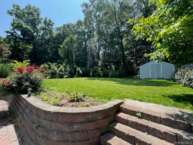 a view of a garden with a fountain