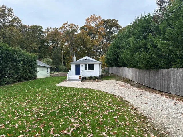 a house view with a garden space