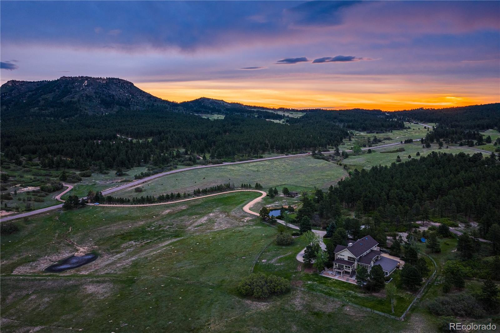 3282 Tomah Road Larkspur, CO 80118 - Photo 3 of 35 a view of an outdoor space yard and mountain view