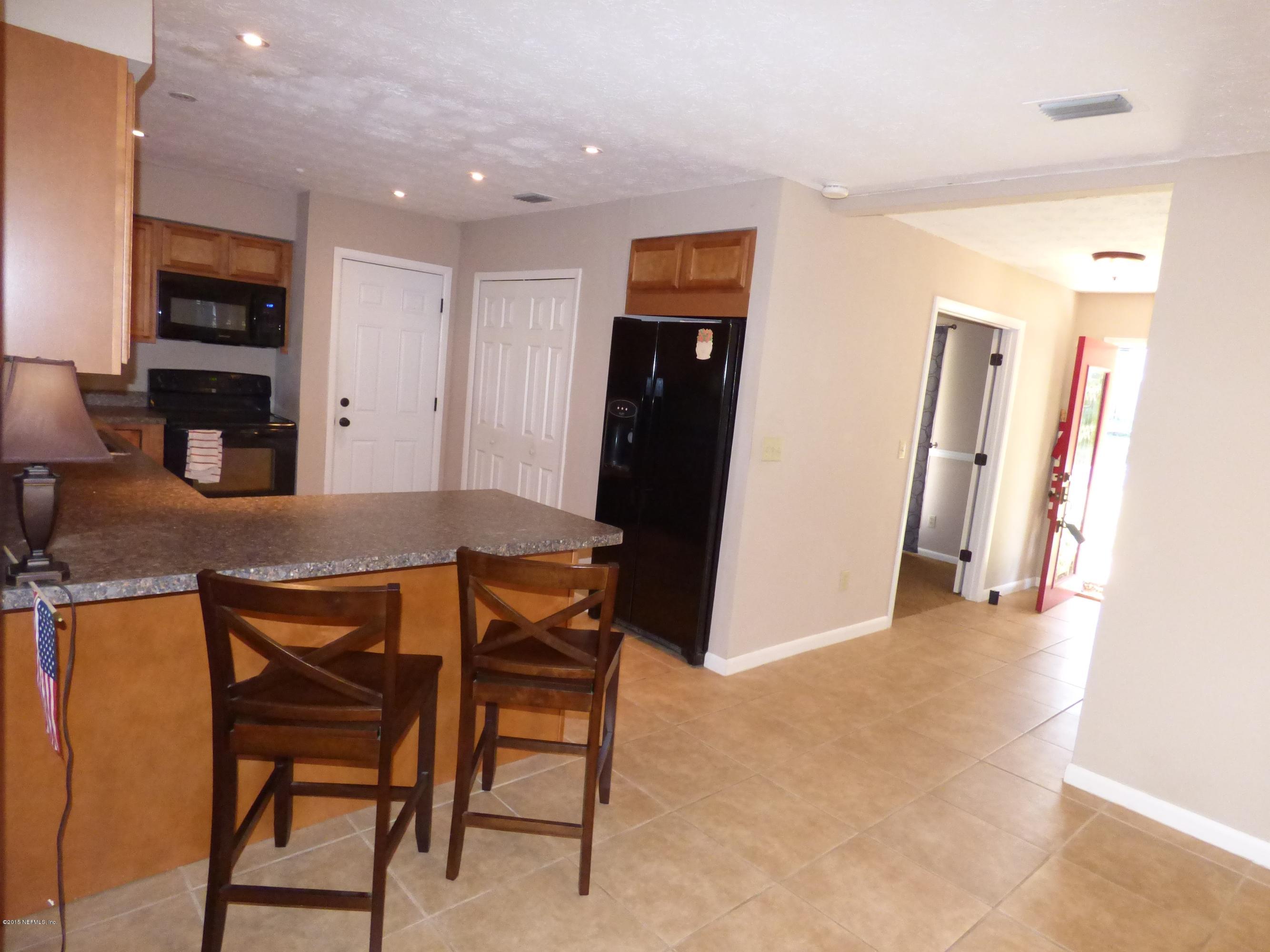 10129 Lake View Road West Jacksonville, FL 32225 - Photo 7 of 24 Kitchen and Foyer