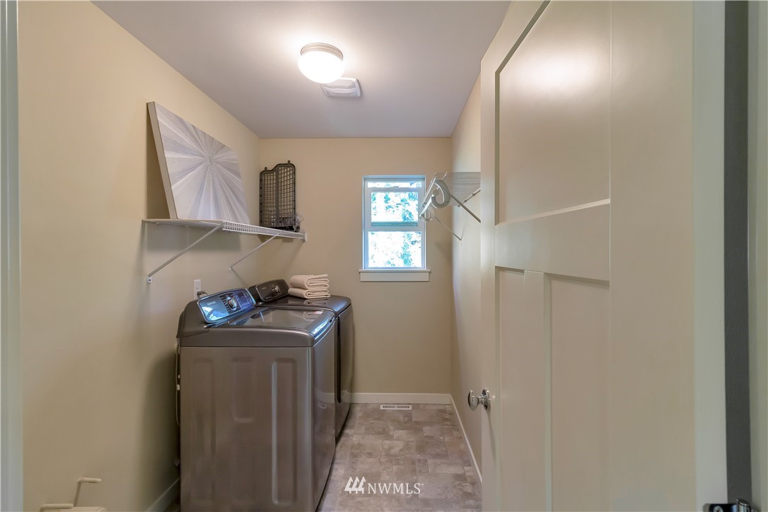 4431 225th Place Southeast Bothell, WA 98021 - Photo 12 of 19 a view of a storage and utility room in a house