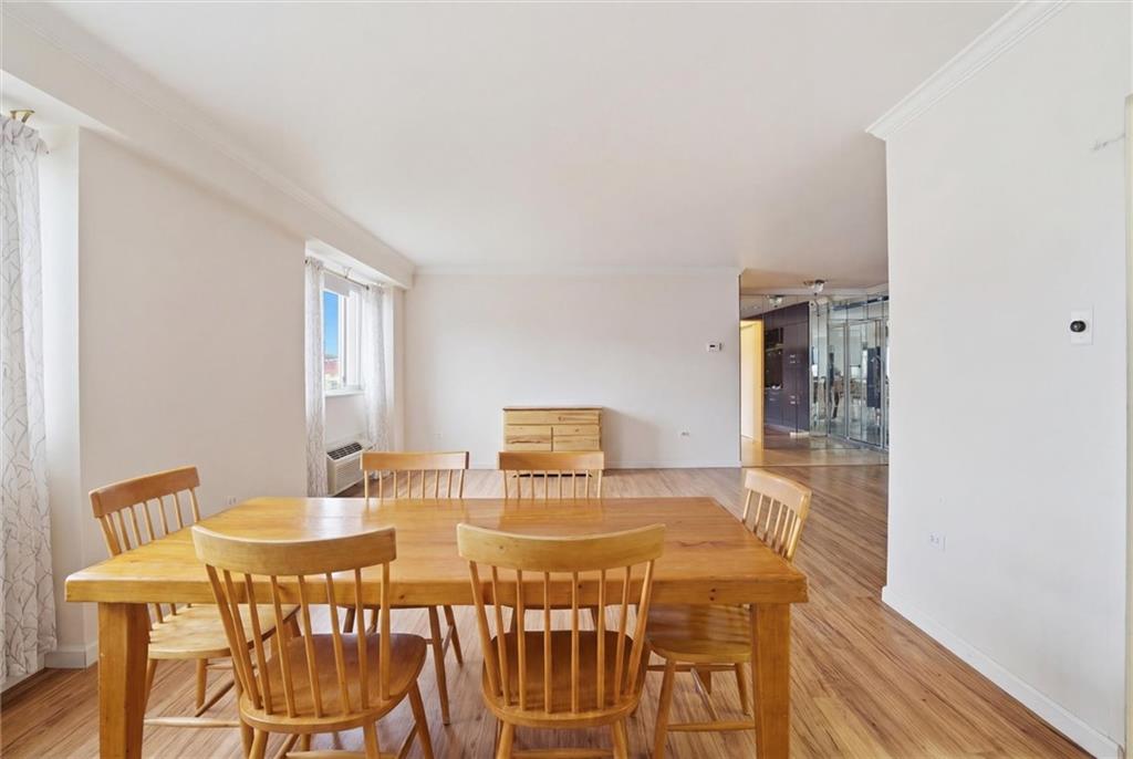128 North Craig Street, Unit 511 Pittsburgh, PA 15213 - Photo 14 of 46 a view of a dining room with furniture and wooden floor