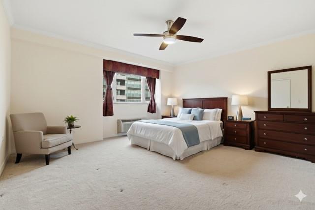 128 North Craig Street, Unit 511 Pittsburgh, PA 15213 - Photo 27 of 46 a spacious bedroom with a bed a couch and a window