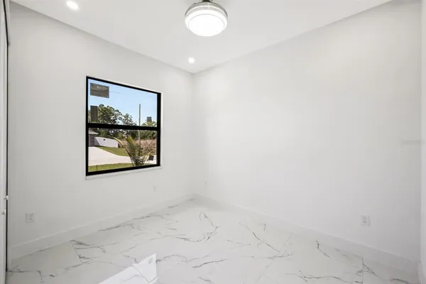an empty room with windows