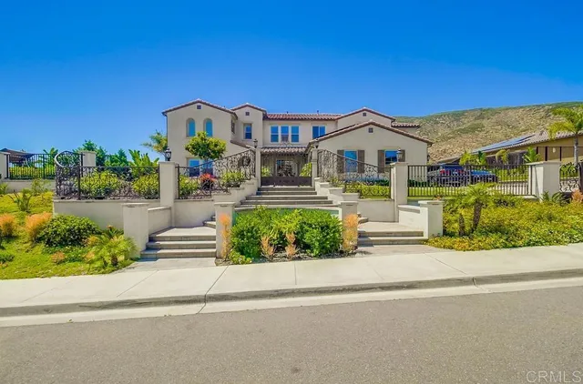 front view of a house with a small yard
