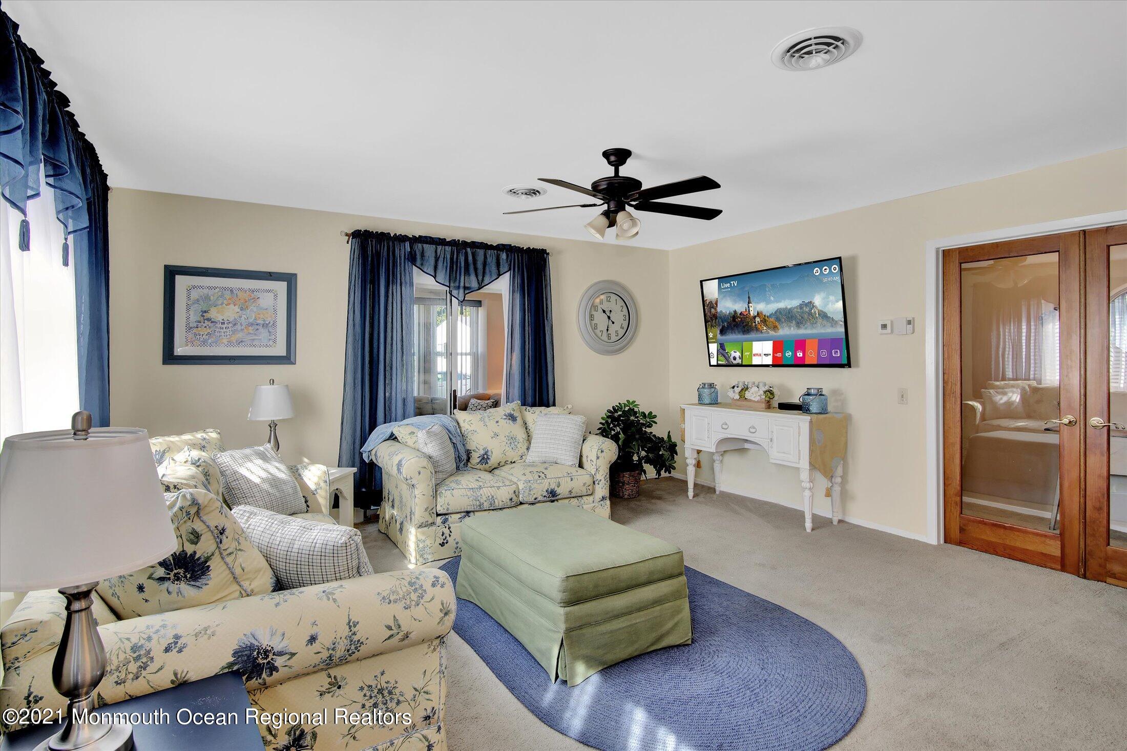 17 Ashley Road Whiting, NJ 08759 - Photo 11 of 31 a living room with furniture and a flat screen tv